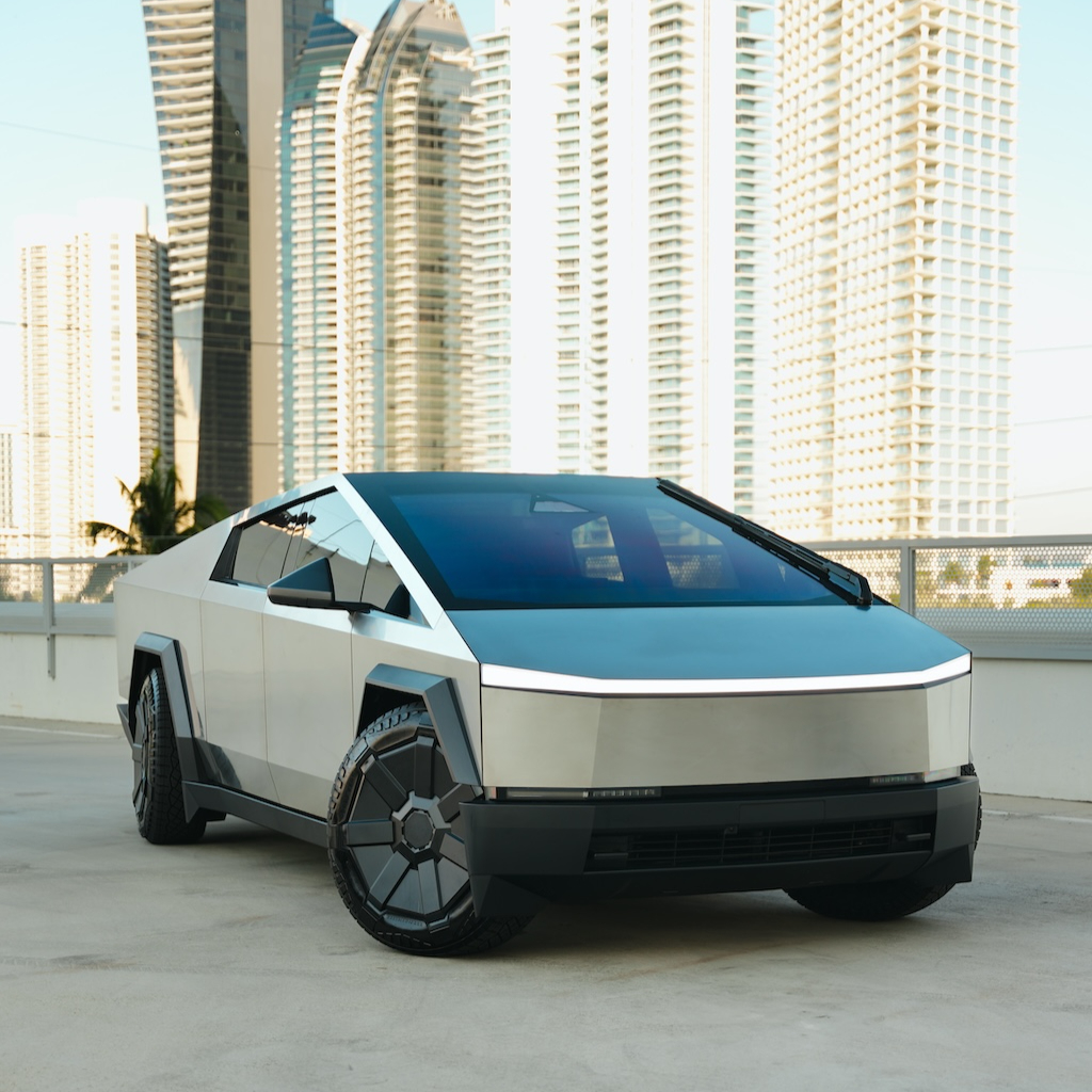 Tesla Cybertruck Cyberbeast rental in Miami — stainless steel exterior